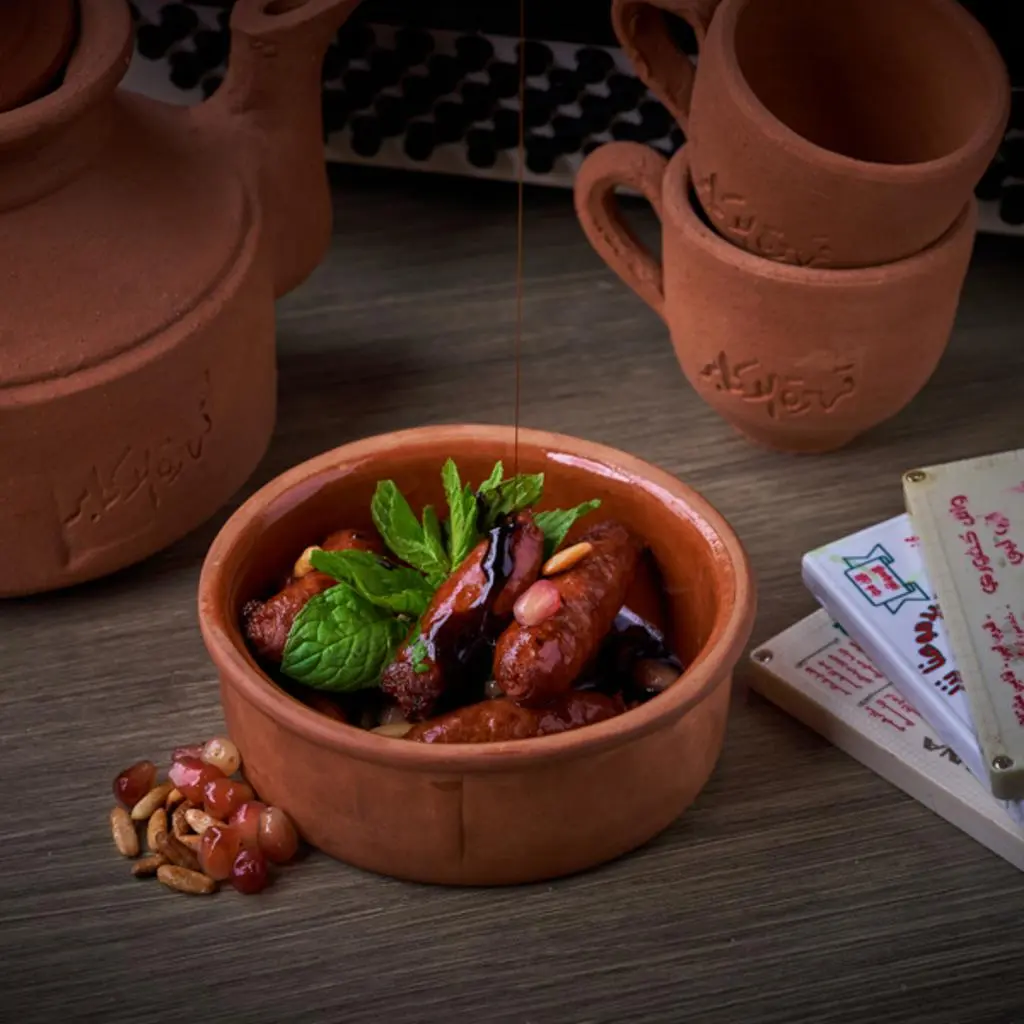 Sausage with Pomegranate Molasses